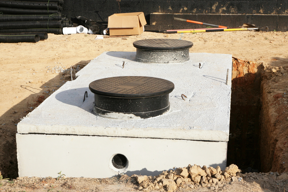 Emptying household septic tank. Cleaning sludge from septic system.