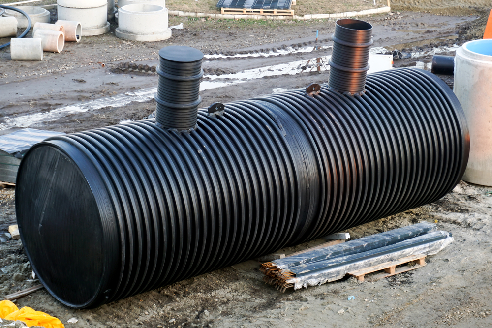 Emptying household septic tank. Cleaning sludge from septic system.